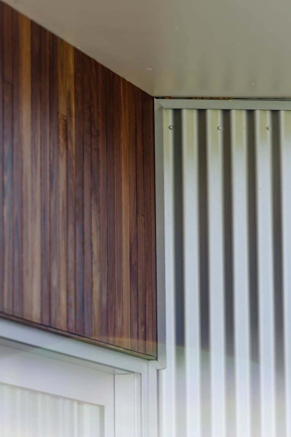 Spotted gum timber cladding meeting corrugated steel, Mogilla Farm